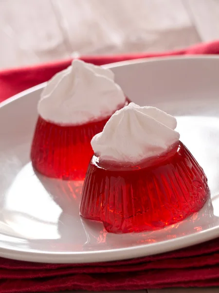 Red jello with cream — Stock Photo, Image