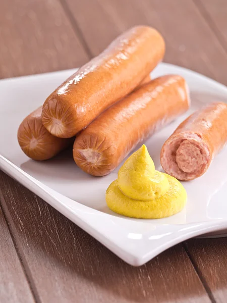 Sausage with mustard — Stok fotoğraf