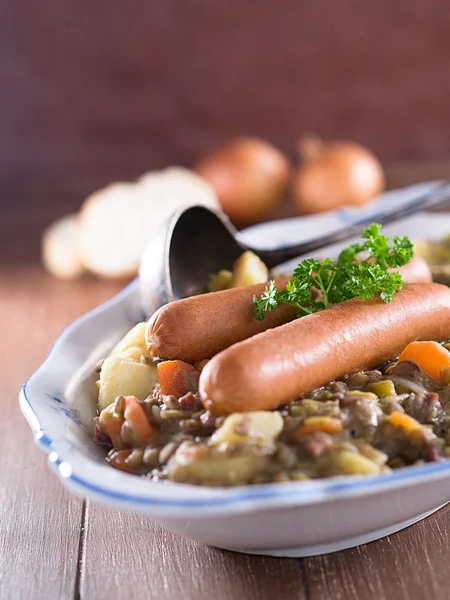 Lentil soup with sausages — Stock Photo, Image
