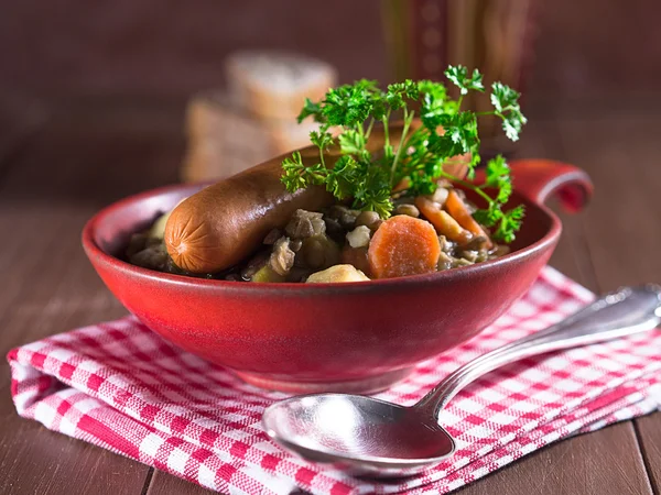 Lentil soup with sausages — Stock Photo, Image