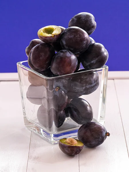 Plums in a glass — Stock Photo, Image