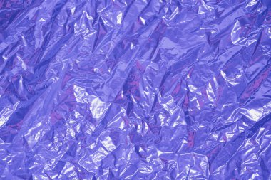 parlak metal folyo levhaları kadife eflatun renginde. Arkaplan ya da peri arkaplanı. Tek Renkli