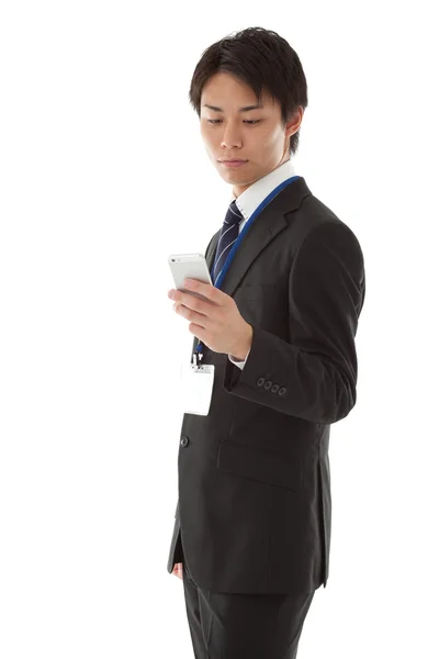 Hombre de negocios trabajando con el teléfono —  Fotos de Stock