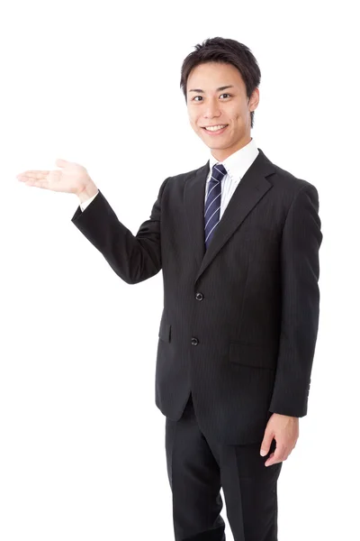 Businessman that shows direction by hand — Stock Photo, Image