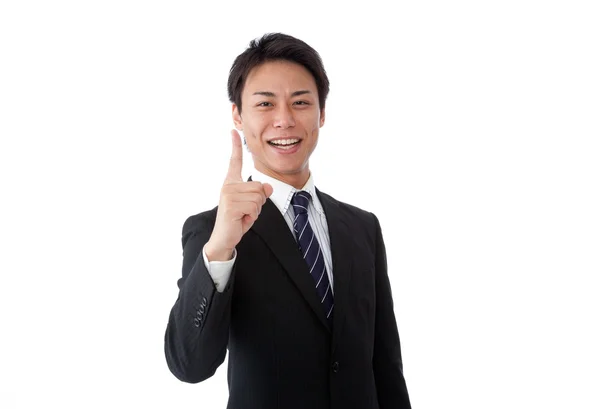 Young businessman making a finger — Stock Photo, Image