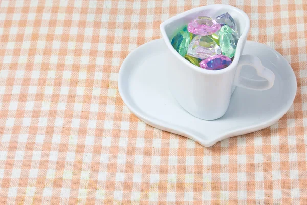 Coração colorido em um copo — Fotografia de Stock