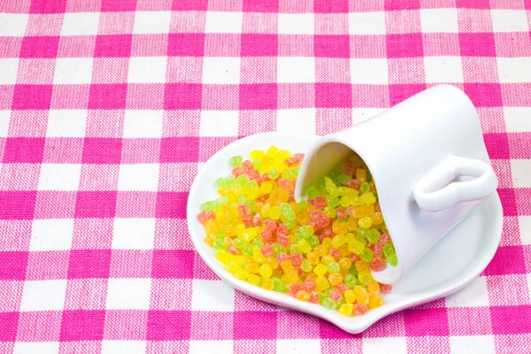 Bunte Trockenfrüchte und Kaffeetasse — Stockfoto