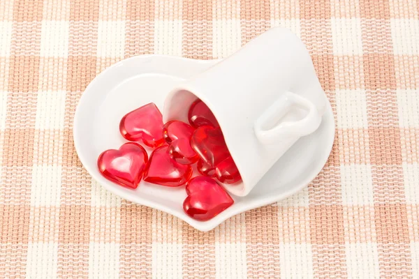 Corazón rojo y taza de café en forma de corazón — Foto de Stock