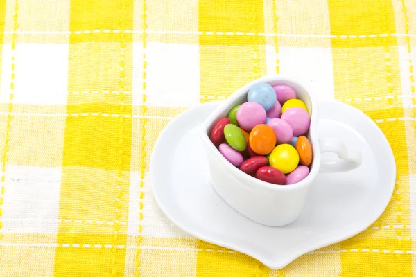 Cioccolato colorato e tazza di caffè — Foto Stock