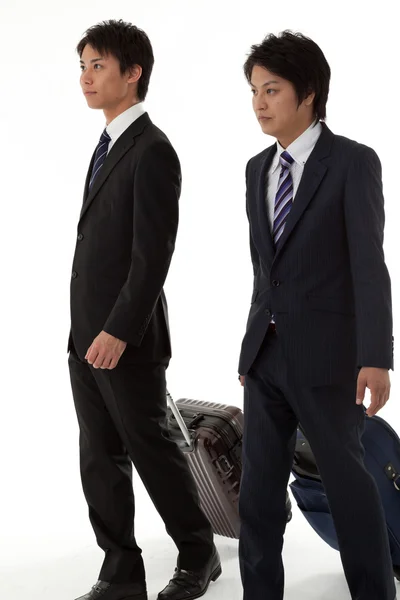 Dois jovens empresários em viagem de negócios — Fotografia de Stock