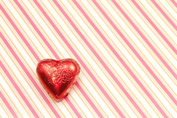 Red heart-shaped chocolate Stock Photo