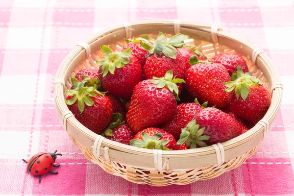 Strawberries served in a basket — Stock Photo, Image