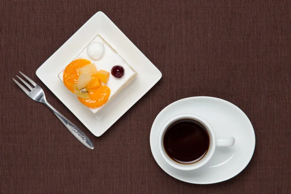 Fruits cake and coffee — Stock Photo, Image