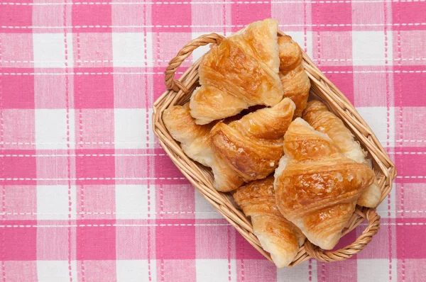 Mini croissant that was placed in a basket — Stock Photo, Image