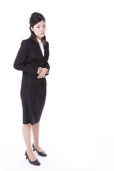 Business woman suffering from abdominal pain — Stock Photo, Image