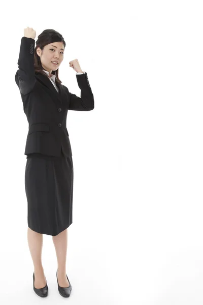 Young business woman doing a guts pose — Stock Photo, Image