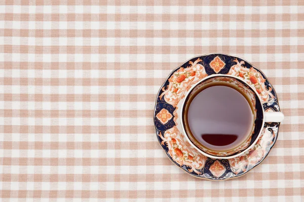 Coffee on the table cloth — Stock Photo, Image