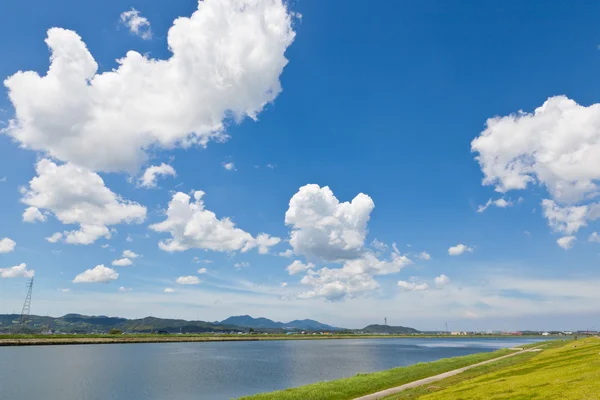 Summer sky and river — Stock Photo, Image