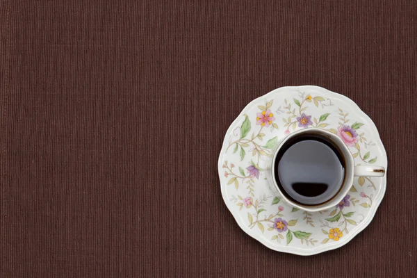 Coffee on the table cloth — Stock Photo, Image