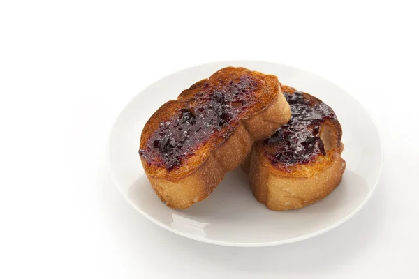 Toast with blueberry jam — Stock Photo, Image