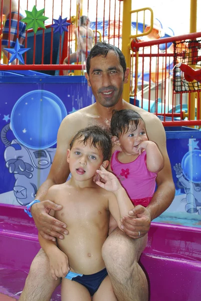 Family at the water park. — Stock Photo, Image