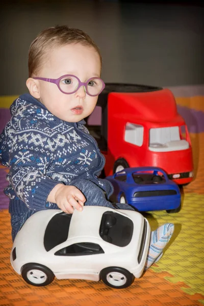 Little Funny Boy Blue Sweater Glasses Plays Typewriter Playroom — Stock Photo, Image