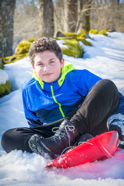 Bright Sunny Day Winter Boy Slides Hill Plastic Sled His — Stock Photo, Image