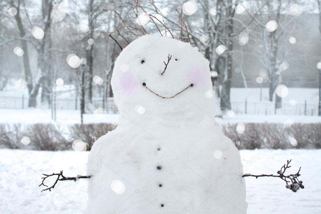 Fun snowman in park.