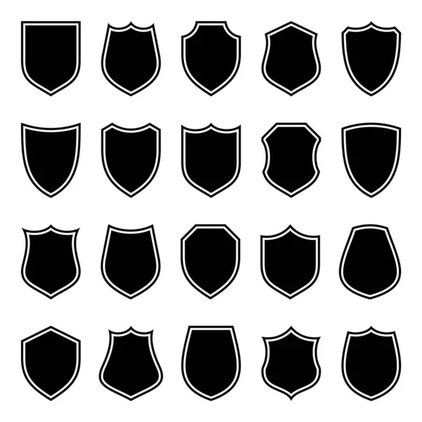 Set van verschillende vintage shield iconen. Zwart geschetst heraldische schilden. Beschermings- en veiligheidssymbool, etiket. Vectorillustratie. — Stockvector