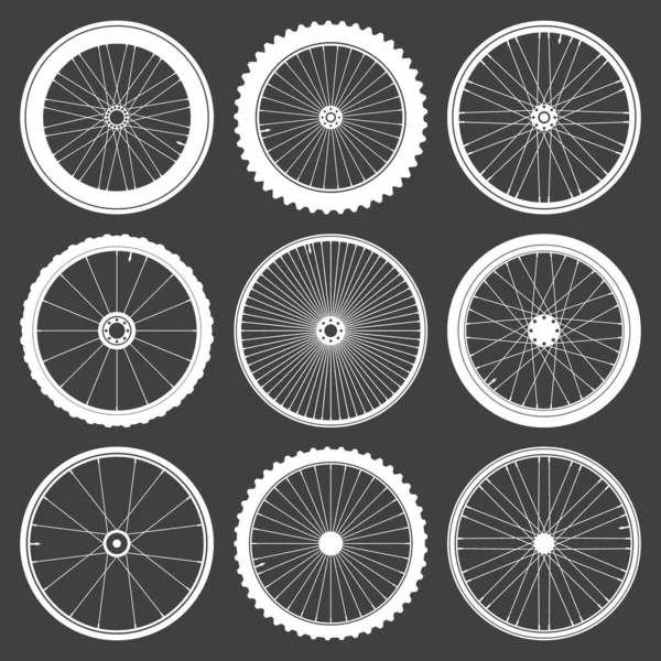 White bicycle wheel symbols collection. Bike rubber tyre silhouettes. Fitness cycle, road and mountain bike. Vector illustration. — Stock Vector