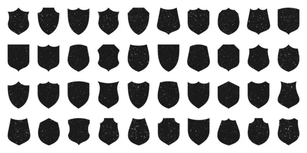 Σύνολο από διάφορες vintage εικόνες ασπίδα. Μαύρες εραλδικές ασπίδες με υφή grunge. Σύμβολο προστασίας και ασφάλειας, ετικέτα. Εικονογράφηση διανύσματος. — Διανυσματικό Αρχείο