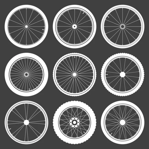 Colección de símbolos de rueda de bicicleta blanca. Siluetas de neumáticos de goma para bicicletas. Ciclo de fitness, carretera y bicicleta de montaña. Ilustración vectorial. — Archivo Imágenes Vectoriales