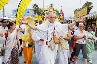 Hari Krishna leader in the 37th Annual Festival of the Chariots clipart