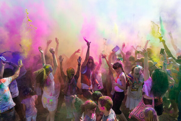 People celebrating Holi Festival of Colors. Stock Picture