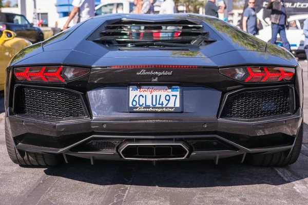 Lamborghini nero in mostra parcheggio in occasione di un evento annuale Super — Foto Stock