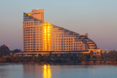 Seyhan River and aesthetic building reflection / Adana - Turkey