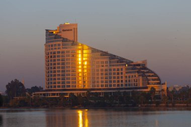 Seyhan River and aesthetic building reflection / Adana - Turkey