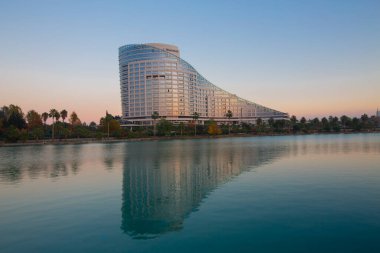 Seyhan River and aesthetic building reflection / Adana - Turkey