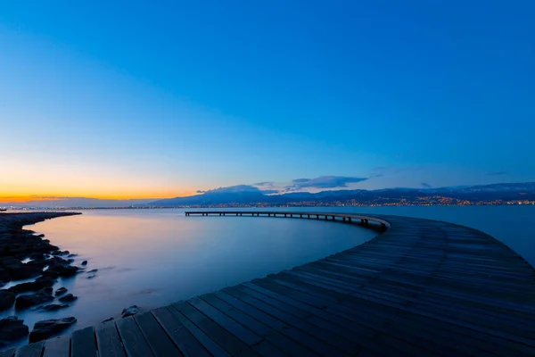 Boomerang Shaped Pier Sea Photographed Long Exposure Technique — Stock Photo, Image