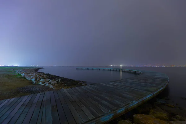 Boomerang Shaped Pier Photographed Using Long Exposure Technique — Photo