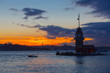 The Maiden's Tower, the most beautiful historical lighthouse of Istanbul, was photographed at sunset.