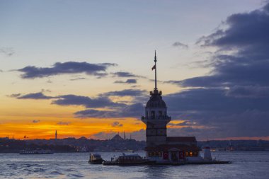 The Maiden's Tower, the most beautiful historical lighthouse of Istanbul, was photographed at sunset.