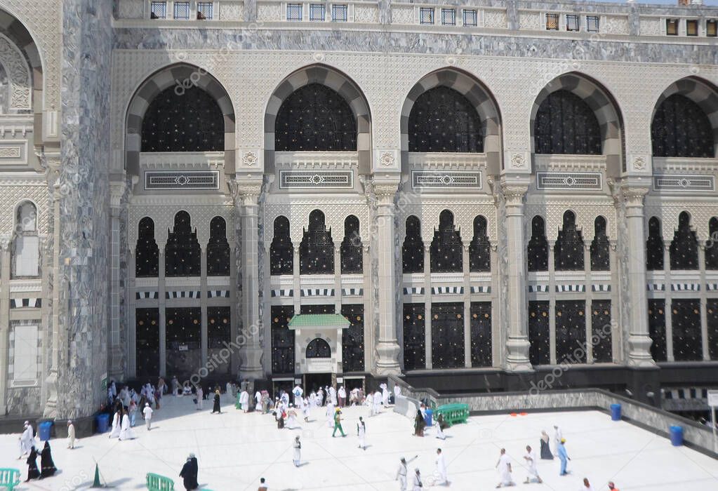 The Kaaba , the minarets and walls of the Holy Place of the Muslims .