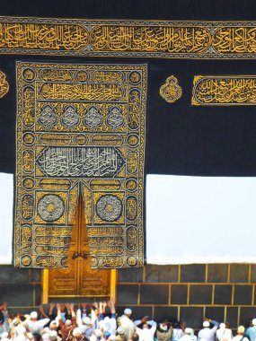 Mecca Saudi Arabia. Muslim people praying together at holy place.