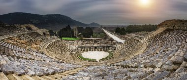 The Theatre of Ephesus (Efes) at Selcuk in Izmir Province, Turkey. The amphitheatre is the largest in the ancient world for gladiatorial combats and drama. Ephesus is a popular tourist destination. clipart