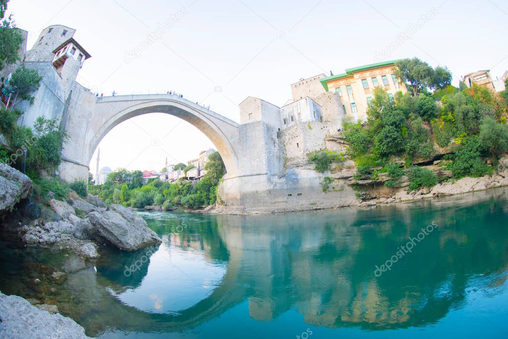 Historical Stari Most bridge over Neretva river in Mostar Old town, Balkan mountains, Bosnia and Herzegovina