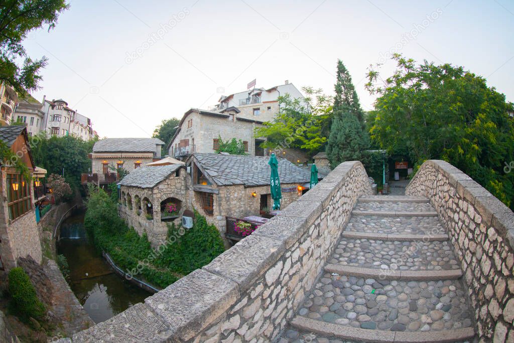 Historical Stari Most bridge over Neretva river in Mostar Old town, Balkan mountains, Bosnia and Herzegovina