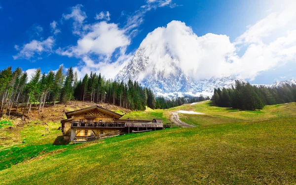 View from a vantage point of the valley with the ski slopes and the Zugspitze in summer in Ehrwald in Austria.