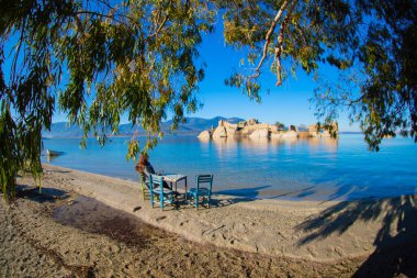 Bafa lake is a peaceful place, ringed by traditional villages such as Kapkr full of fisherman boats and ruins of Herakleia