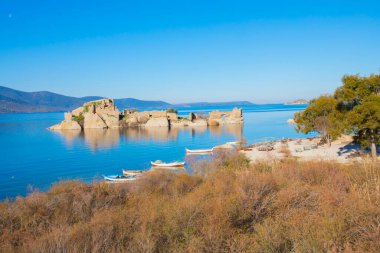 Bafa lake is a peaceful place, ringed by traditional villages such as Kapkr full of fisherman boats and ruins of Herakleia